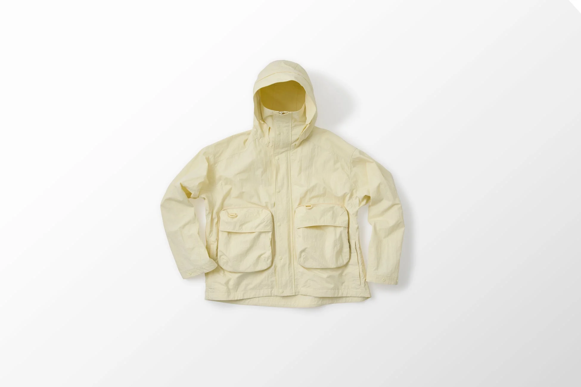 淡い黄色のパーカー商品写真